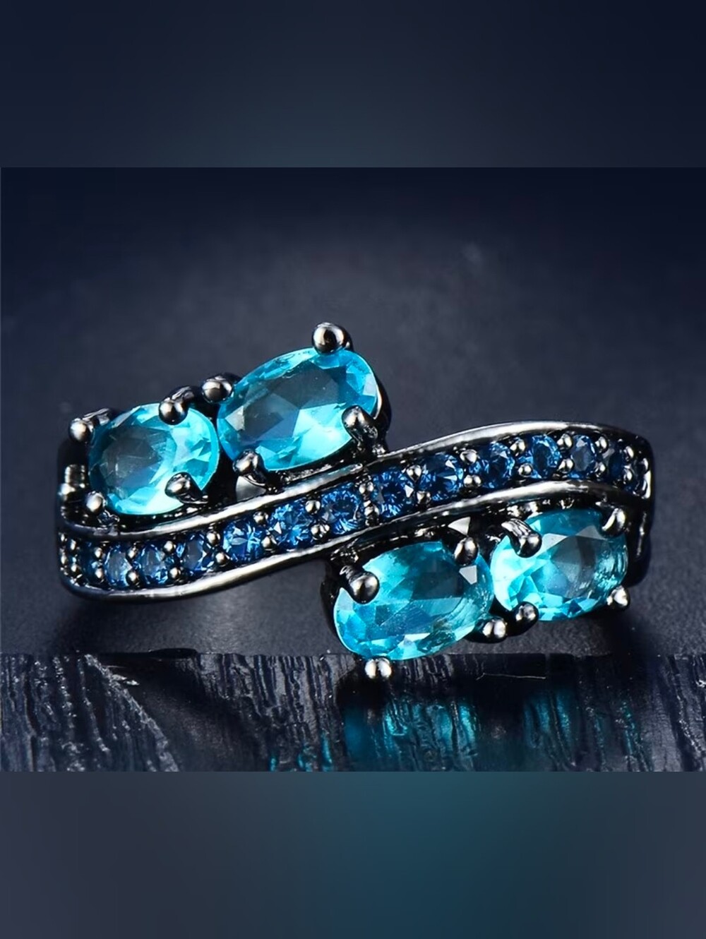 $8 Each Or Bundle 5/$20 Blue Crystal Twist Black Ring